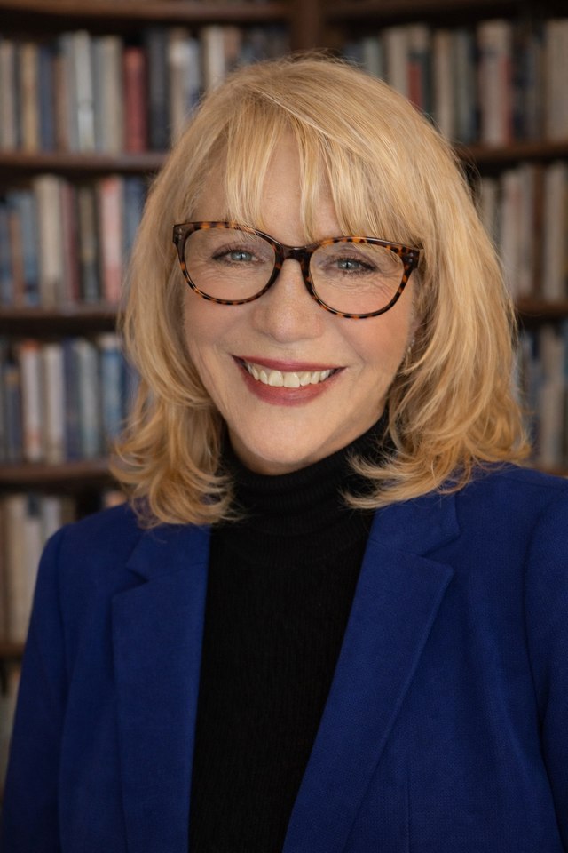 Yvonne Copeland, LICSW, MSW, smiling warmly in a navy blazer